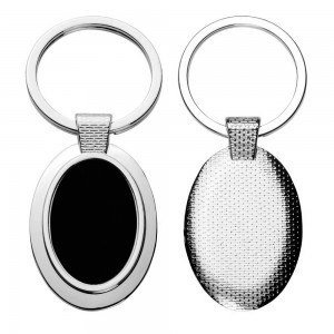 Chaveiro de metal oval, com detalhe preto espelhado