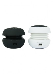 Mini caixa de som redondo, com o conector de fone de ouvido, e cabo usb para carregar